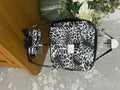 The Sue Sue Sling Bag - Animal Print Textured Vinyl