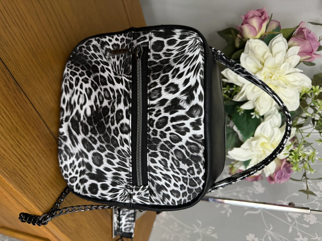 The Sue Sue Sling Bag - Animal Print Textured Vinyl