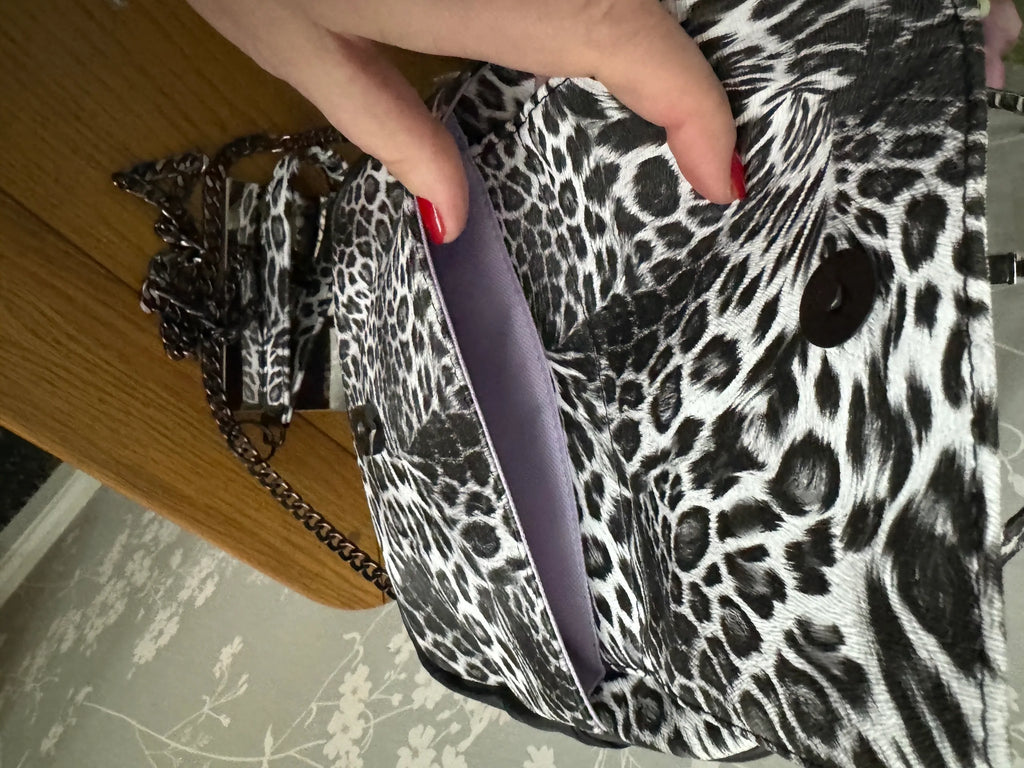 The Sue Sue Sling Bag - Animal Print Textured Vinyl